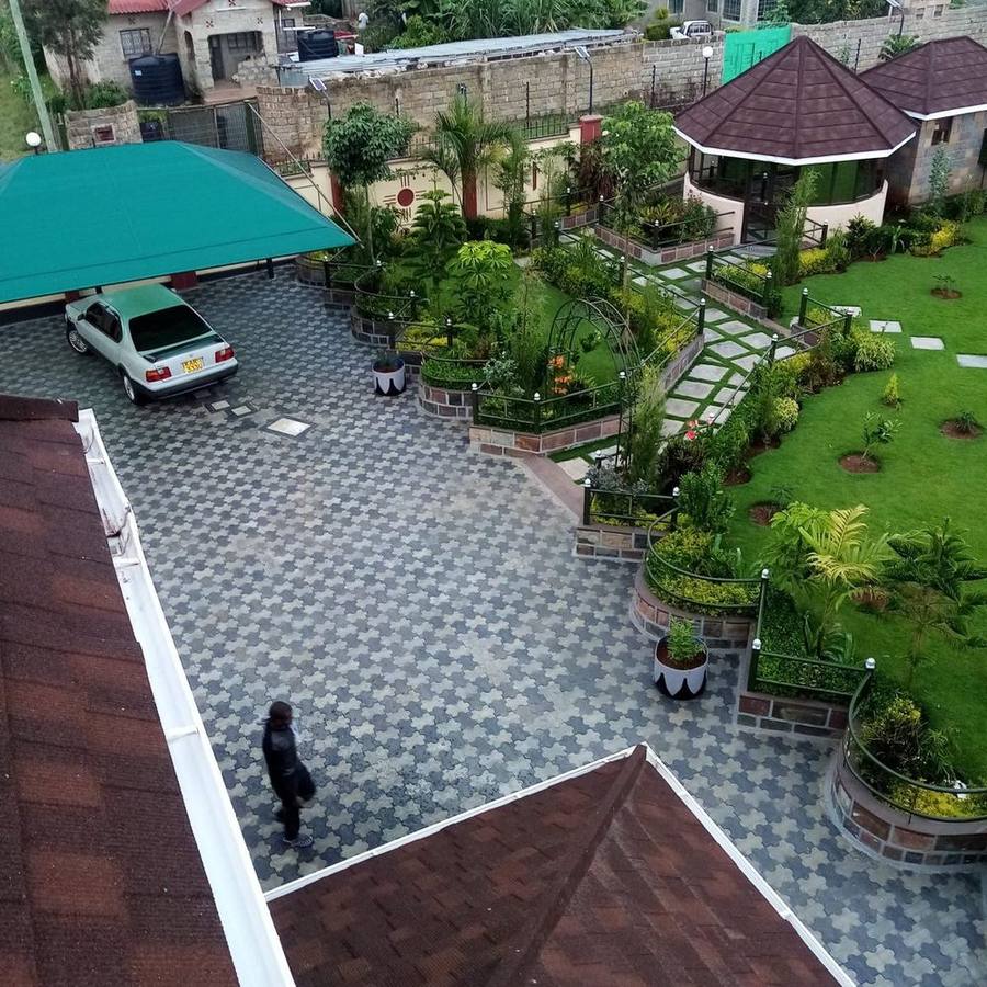 Aerial view of a landscaped compound courtyard