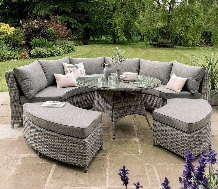 Grey rattan outdoor corner sofa set with dining table