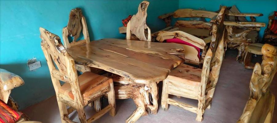 Rustic wooden dining table and chairs set, hospitality-style furnishing