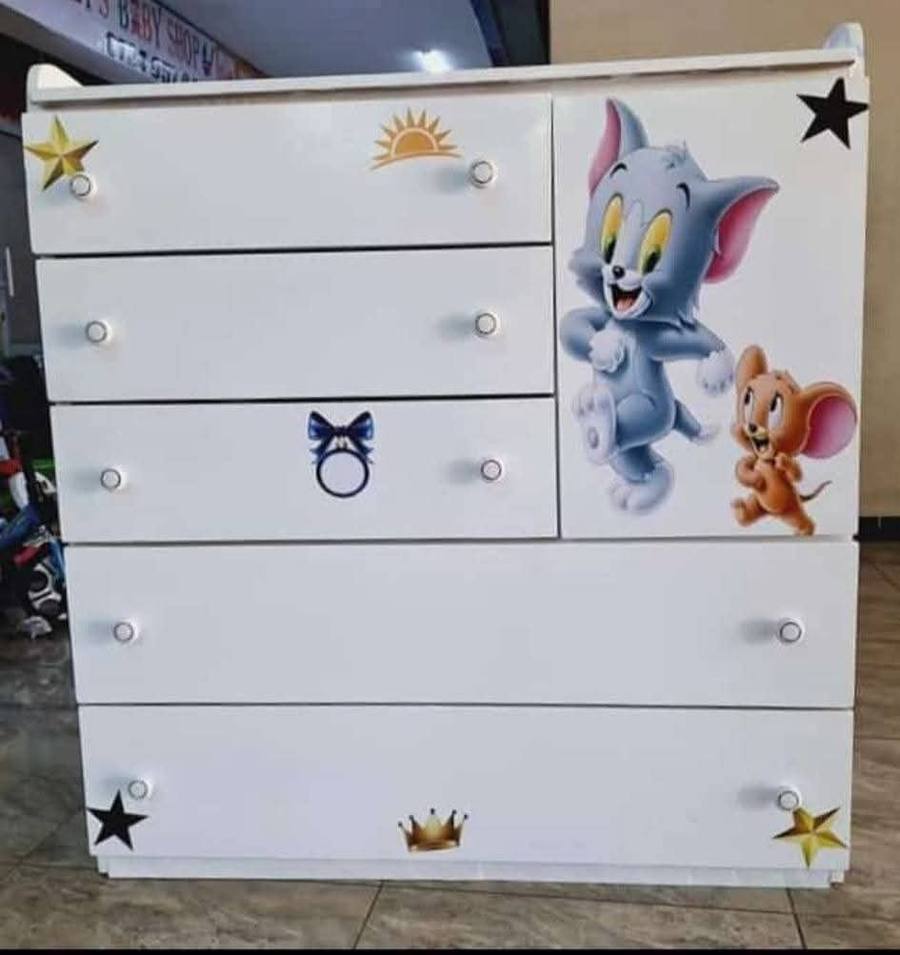 Kids' dresser with cartoon character decals
