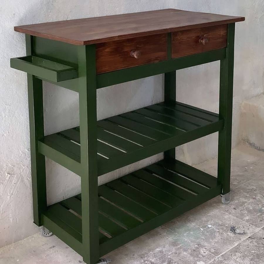 Green painted wood console table with drawers and shelving