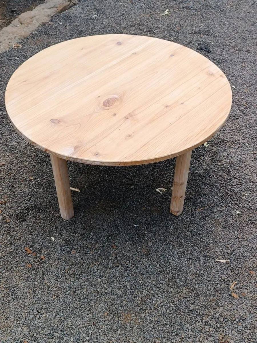 Round light-wood coffee table