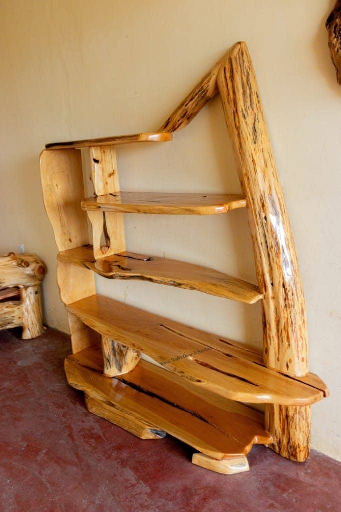 Custom raw-wood shelving unit, an example of Waridi DelArt joinery