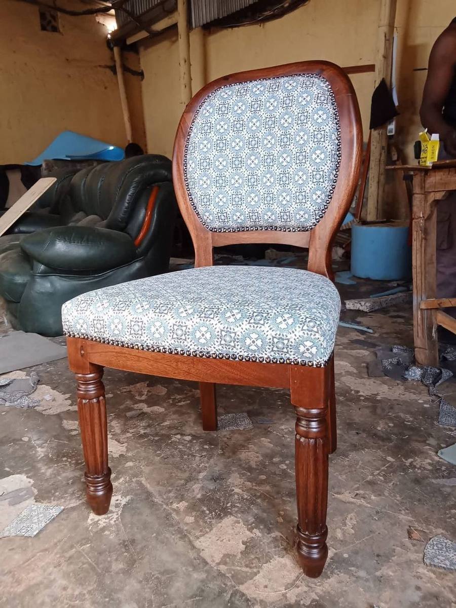 Dining chair reupholstered in a blue patterned fabric
